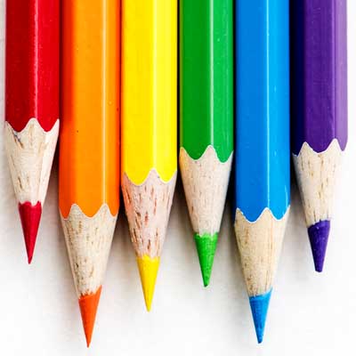 Rainbow crayons in a row.