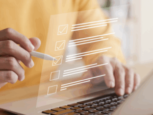 Checklist concept, person using laptop doing online checklist survey.