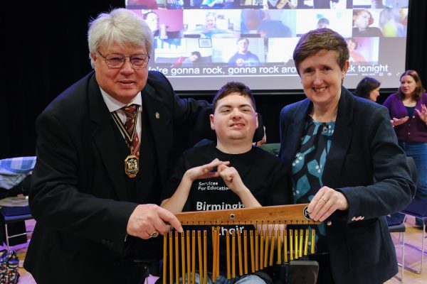 Deputy Lord Mayor Cllr Ken Wood, Choir member Hugh Murphy, and Chief Executive at Services For Education, Sharon Bell, pictured at Inclusive Choir Showcase Concert.